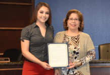 Resolution in honor of Treasurer Norma G. Garcia L-R: Lorena Celeste Carillo and Treasurer Norma G. Garcia.