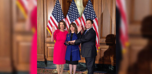 Congressman Vicente Gonzalez (TX-15) with his wife, Lorena Saenz Gonzalez, and Speaker of the House Nancy Pelosi.  