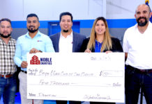 Noble and Subcontractors Made a Difference at Boys & Girls Club of San Benito Pictured above from L-R: Johnny Martinez Superintendent; Jose Castro Project Manager; Alfredo Garcia, Vice President Noble Texas Construction and San Benito Boys & Girls Club board member; Liz Chavez, San Benito Boys & Girls Club Board President, and Eric Delgado Project Manager. The check is a $5,000 donation from Noble Texas Builders to benefit the San Benito Boys & Girls Club. Photo by Roberto Hugo Gonzalez