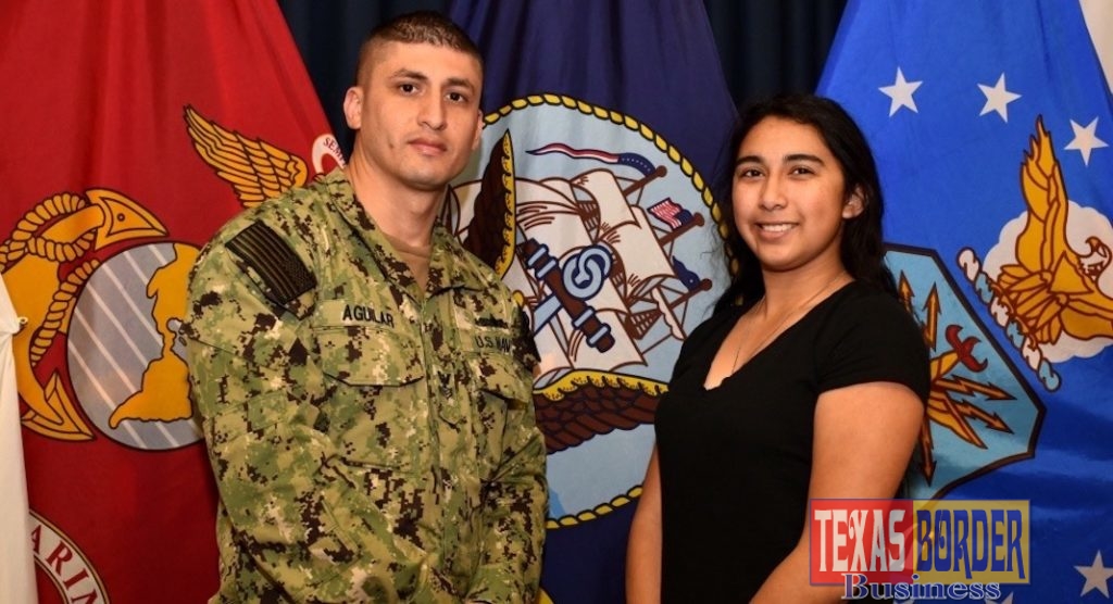 Navy Counselor 1st Class Ivan Aguilar of Pharr, Texas, poses for a photo with his sister, Lesley Torres of Edinburg, Texas.
