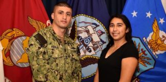 Navy Counselor 1st Class Ivan Aguilar of Pharr, Texas, poses for a photo with his sister, Lesley Torres of Edinburg, Texas.