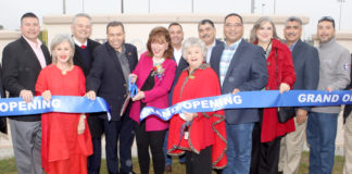 Janet Ogden Vackar cuts the ribbon of the new sports complex named in her honor during the grand opening ceremony in northeast Edinburg.