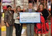Blue Cross Blue Shield Donates $25,000 to Food Bank RGV Child Hunger Programs “BCBS FEED CHILDREN” Blue Cross Blue Shield presenting check to Jackie Flores, FBRGV and Ron Meijerink, CEO, FBRGV. Photo credit: Food Bank RGV.