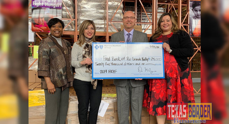“BCBS FEED CHILDREN” Blue Cross Blue Shield presenting check to Jackie Flores, FBRGV and Ron Meijerink, CEO, FBRGV. Photo credit: Food Bank RGV.