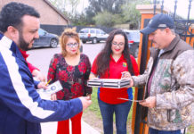 Edinburg CISD migrant recruiters go door-to-door visiting with students and their families in northwestern Hidalgo County. Pictured L-R: ECISD Migrant Recruiter Michael Martinez, ECISD Migrant Recruiter Delia Sanchez, ECISD Migrant Recruiter Maricela Valdez and Martin Valdez, an ECISD parent.