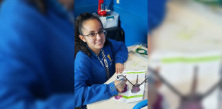 Boys & Girls Clubs of Edinburg RGV member Itzel Padron, learns how to use a 3-D pen as a part of the STEM Mentoring Makerspace.