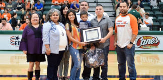 Amanda Cruz, an interdisciplinary studies sophomore at UTRGV, won the 2019 Family of the Year essay. Shown here surrounded by her son, husband and other family members who are helping her achieve her dreams of graduating university, she was recognized at the UTRGV Homecoming Basketball game in February. She was also recognized again by throwing the first pitch at UTRGV Baseball’s Selena Night on April 6 in Edinburg. (Courtesy Photo)