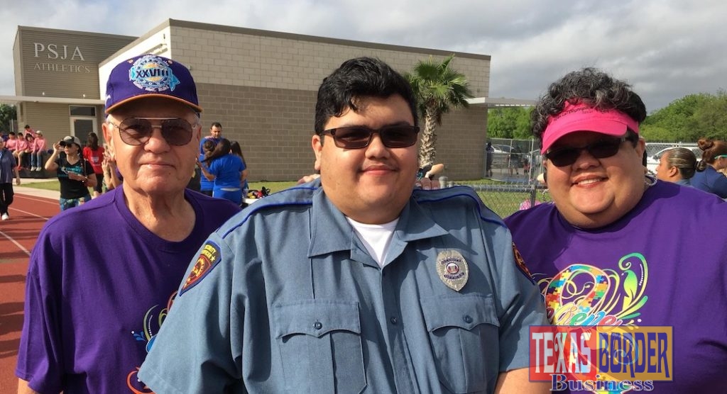 PSJA ISD Security Guard and alumnus Anthony Salinas pictured with his mother Debra Salinas while working at the 7th Annual PSJA Autism Awareness Walk on Saturday, March 30.