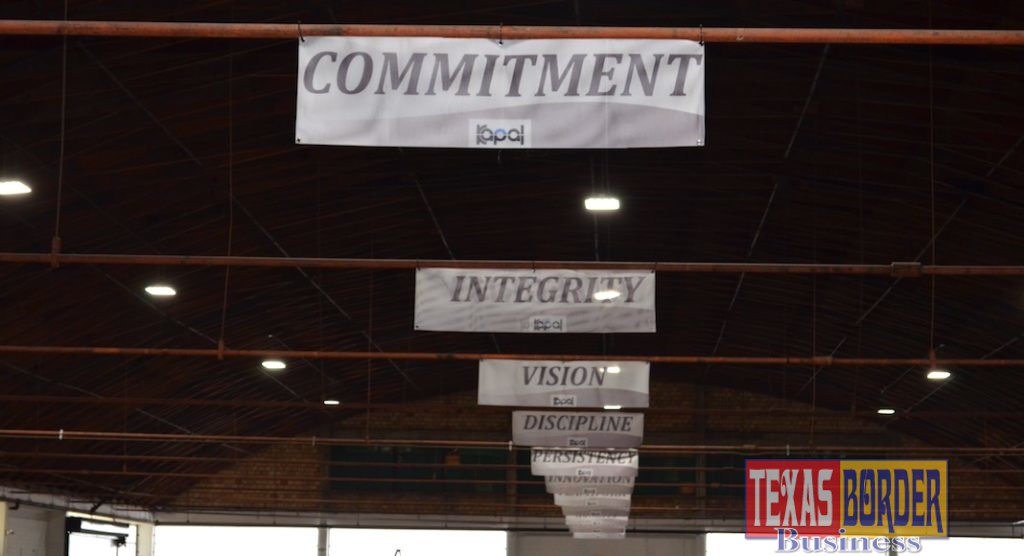 Hanging banners of employee support and motivation signs.