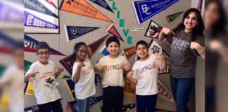 When UTRGV legacy alumna Margaret Medina-Olivarez, a McAllen native, asked universities around the country to send her their T-shirts so she could have a picture of her elementary school students wearing them, her request drew national attention. Olivarez has been a third-grade bilingual teacher at Pflugerville Independent School District’s Copperfield Elementary School for more than 10 years, after earning a bachelor’s degree in Interdisciplinary Studies with a concentration in education from UT Pan American. She is shown here with some of her students wearing the T-shirts garnered during her campaign to bring them awareness of higher education. (Courtesy Photo)