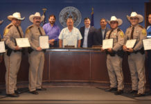 Sheriff Deputies honored for Bravery and Heroism in the Line of Duty L-R: Dep. Joseph Trevino, Dep. Oscar Elizando, Sheriff J.E. "Eddie" Guerra, Pct. 3 Commissioner