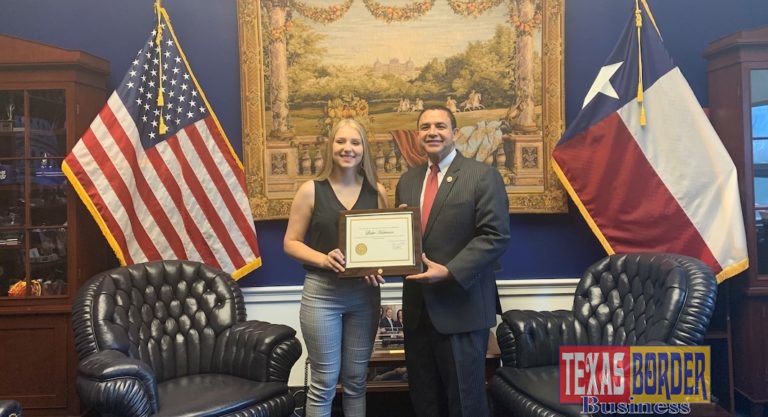 Congressman Cuellar presents Leslie Hartman, winner of the Congressional Art Competition for District 28, with a Congressional Certificate of Recognition at his office in Washington, D.C., Monday.