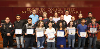 Students from the Edinburg CISD First Time Offender Program pictured with (top row L-R) ECISD Superintendent Dr. René Gutiérrez, ECISD Board Member Dominga “Minga” Vela, ECISD Board Member Leticia “Letty” Garcia, Hidalgo County District Attorney Ricardo Rodriguez Jr. and officers from the ECISD Police Department.