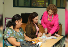 South Texas College Intermediate ESL Instructor Adelita Figueroa-Muñoz assisting a PSJA parent during class.