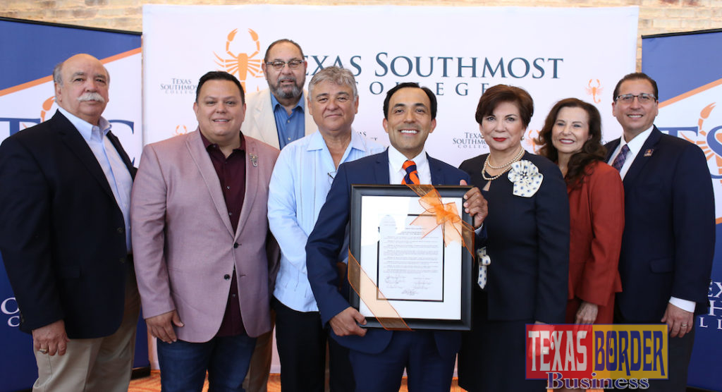 The Texas Southmost College Board of Trustees honored Board Chair and City of Brownsville Mayor Elect, Trey Mendez, with a resolution during the June 27, 2019 regular meeting at the TSC Performing Arts Center in Brownsville. From left, TSC Trustee Art Rendon, Trustee J.J. De Leon Jr., Trustee Tony Zavaleta, Ph.D., TSC Board Secretary Ruben Herrera, TSC Board Vice Chair Trey Mendez, TSC Board Chair Adela G. Garza, Trustee Eva Alejandro, and TSC President Jesús Roberto Rodríguez, Ph.D.