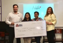 Pictured from left to right, Alfredo Garcia, Director of Operations at Noble Texas Builders and a member of the advisory board for IDEA Alamo STEAM, student Jacqueline Villanueva, and her mom Rosalinda Villanueva holding the scholarship check, and Christine Blouch, Noble Charities Director. Courtesy photo