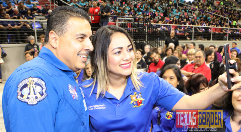 Retired NASA Astronaut Jose Hernandez poses for a selfie with District Parent Round Table Committee Member Angelica Martinez during the Edinburg CISD General Assembly at the Bert Ogden Arena in Edinburg.