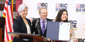 Pictured above is McAllen City Mayor Jim Darling and IBC Bank Senior Vice President Dora Brown presenting Sabrina Dominguez with the Proclamation, stating that August 8th will be Sabrina Dominguez Day.