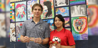 Edinburg North High School art student Brittlee Garcia is pictured holding one of the prizes she was awarded in the Don’t mess with Texas® K-12 Art Contest along with her art teacher, Manuel Saenz Jr., who is holding an H-E-B/Central Market gift card.