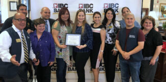 Pictured above are IBC Bank employees, alongside their October Business of the Month recognition.