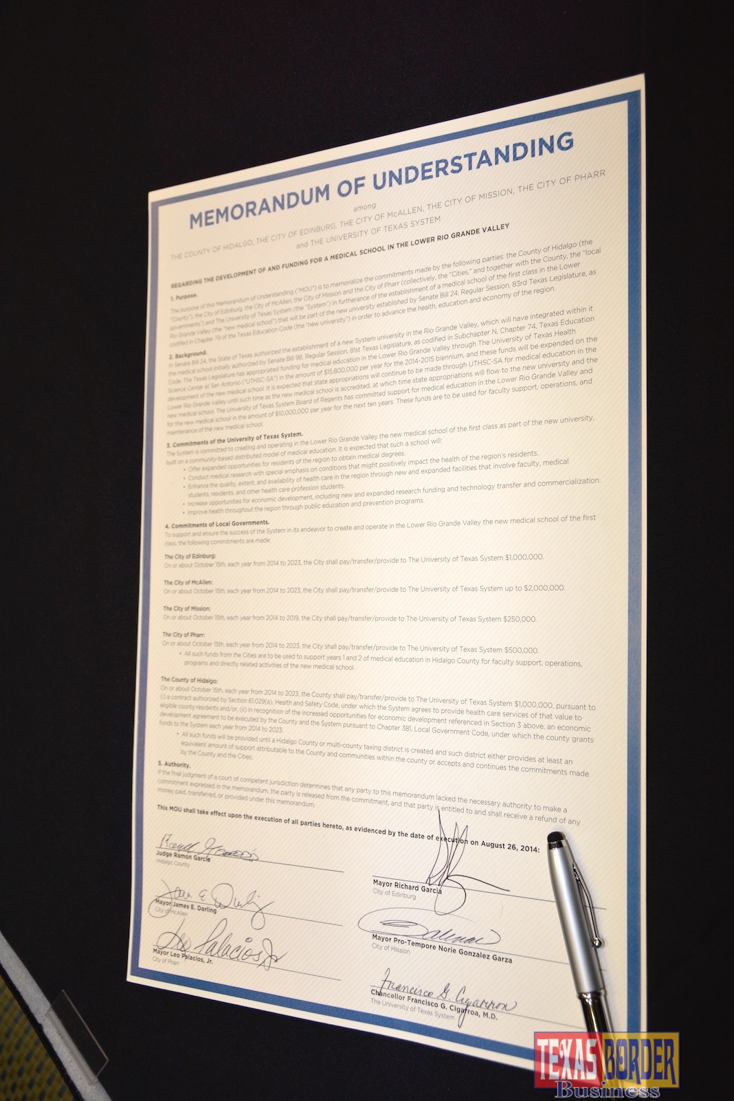 This is the Memorandum of Understanding executed by six leaders committing to fund the school of medicine. Photo by Roberto Hugo Gonzalez August 2014