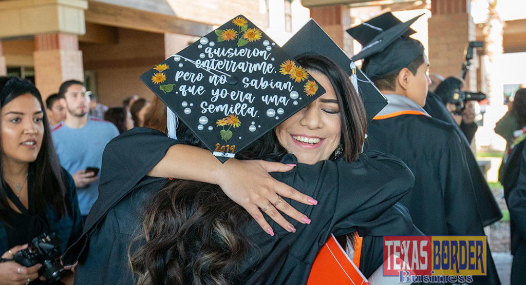 After the 9 a.m. ceremony graduates congratulate each other. (UTRGV Photo by David Pike)