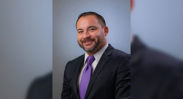 Back where it all started: Local educator helps high school students find success