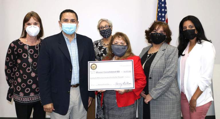 U.S. Congressman Henry Cuellar presents Mission CISD a check
