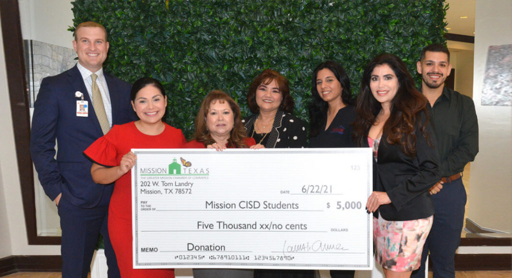 Board members of the Mission Chamber of Commerce, staff and recipient, got together for a check donation celebration. Dr. Carolina "Carol" G. Perez, Superintendent for the Mission CISD received the donation on behalf of the school district.
