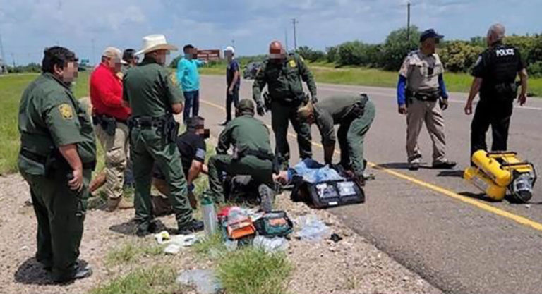 Border PAStrol Agents assist at the scene of an accident. Image courtesy f U.S. Customs and Border Protection.