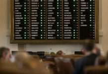 Roll call is tallied on the House floor on Aug. 23, 2021. Photo Credit:  Eddie Gaspar/The Texas Tribune