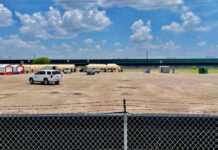 Temporary shelters being constructed to handle the migrant surge in McAllen, TX. Image by Roberto Hugo Gonzalez, Texas Border Business.