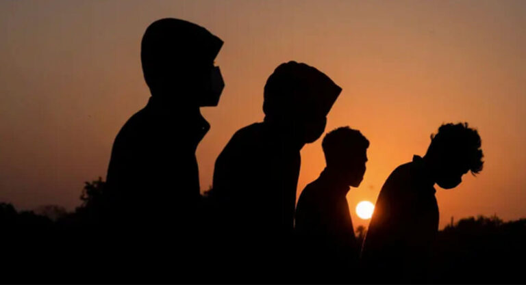 Unaccompanied minors wait to be transported by the U.S. Border Patrol after crossing the Rio Grande into the United States from Mexico in La Joya on April 7, 2021. Credit:  REUTERS/Go Nakamura