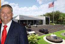 A rendering of the Bert Ogden Cadillac Lyriq dealership. The facility sits across from the multimillion-dollar Bert Ogden Arena.