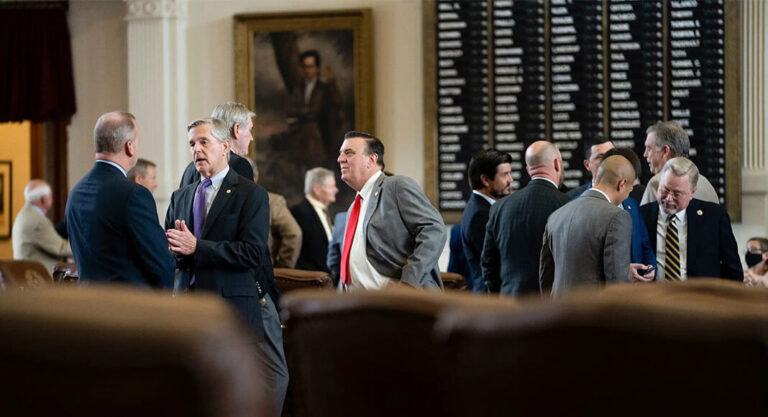 Legislators talk on the House floor on July 29, 2021. Credit: Sophie Park/The Texas Tribune