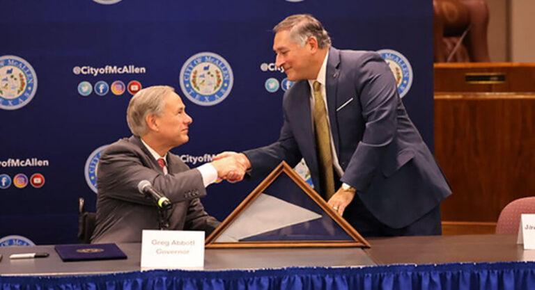 Texas Governor Greg Abbott being greeted by McAllen Mayor Javier Villalobos at the McAllen City Hall. Image: Office Of The Governor