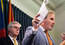 Lt. Gov. Dan Patrick, left, and state Sen. Bryan Hughes, R-Mineola, hold a press conference regarding Democrats breaking quorum over voting legislation at the Texas Capitol on July 21, 2021. Photo Credit: Sophie Park/The Texas Tribune