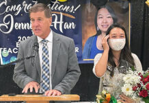 Ms. Han is presented with the Elementary Teacher of the Year Award. Image by Roberto Hugo Gonzalez.