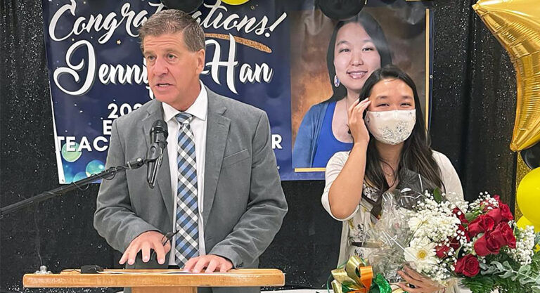 Ms. Han is presented with the Elementary Teacher of the Year Award. Image by Roberto Hugo Gonzalez.