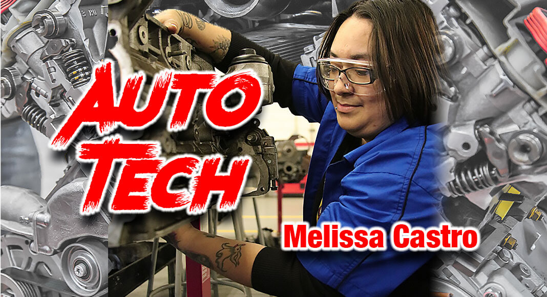 Melissa Castro, a TSTC Automotive Technology student, rotates a 2.0-liter engine during a class lab session. (TSTC photo)