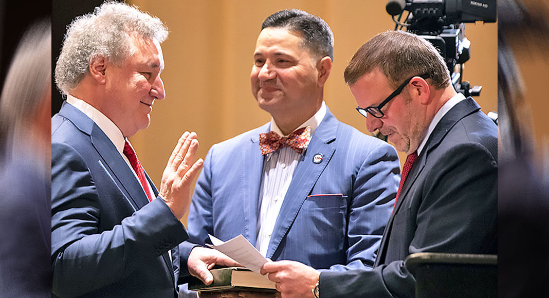 FEATURED, FROM LEFT: Alonzo Cantú of McAllen, Juan Sánchez, President, the University of Houston-Downtown, and Tilman Fertitta, Chair, Board of Regents, University of Houston System. This image of the three Texas leaders features Cantú being sworn in as a member of the University of Houston System Board of Regents soon after his appointment in November 2019 by Gov. Greg Abbott. Photograph Courtesy UNIVERSITY OF HOUSTON SYSTEM