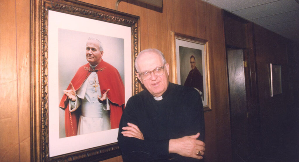 Bishop John J. Fitzpatrick in 1987. Bishop Fitzpatrick asked me if who could select the areas for the picture, and so he did. Pictured in the frame, Pope John Paul II, born Karol Józef Wojtyła, served as Pope and sovereign of the Vatican City State from 1978 to 2005. Photo by Roberto Hugo Gonzalez May 1987