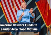 Governor Hands Out Strait To The Heart Funds to Leander Area Flood Victims