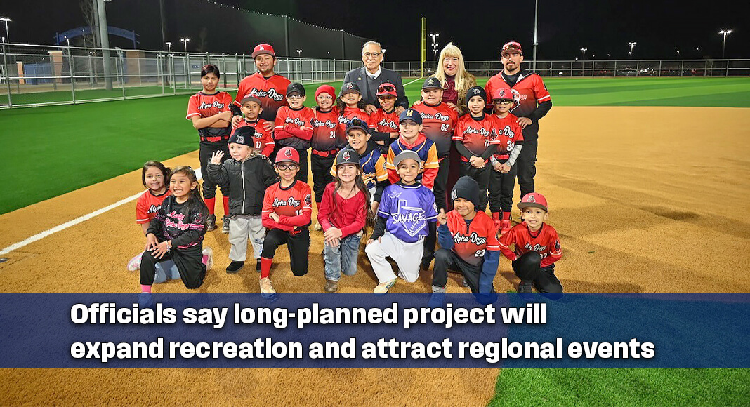 Víctor D. Treviño and his wife, Rosa Márquez de Treviño, joined the Alpha Dogs—among the many teams in attendance—and their coach at the grand opening of the Buena Vista Sports Complex in Laredo, marking a major investment in youth sports, recreation, and economic growth for the community. Courtesy Image City of Laredo, Texas.