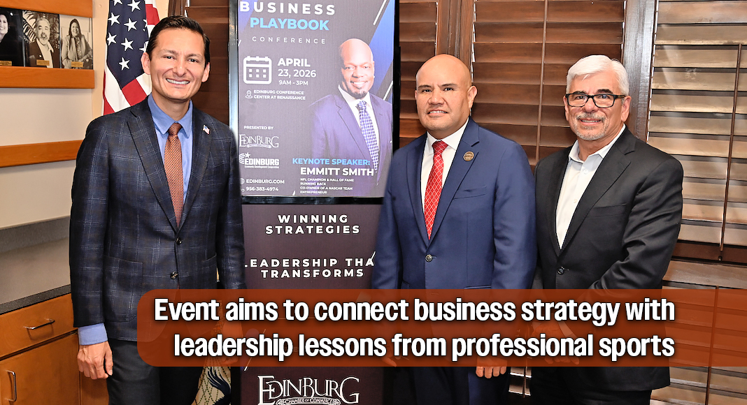 Edinburg Mayor Omar Ochoa, Chamber Executive Director Ronnie Larralde, and Edinburg EDC President Raudel Garza stand before a promotional banner for “The Business Playbook,” featuring keynote speaker Emmitt Smith, during the conference announcement. Image by Noah Mangum González