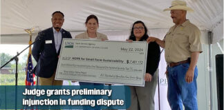 Judge grants preliminary injunction in $7.4 million funding dispute