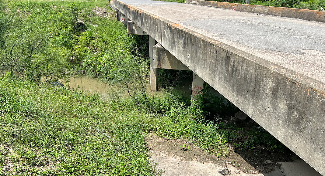 The existing bridge over a drainage ditch crossing will be demolished and replaced with a wider bridge structure that will include two travel lanes and 5-foot shoulders. Courtesy image
