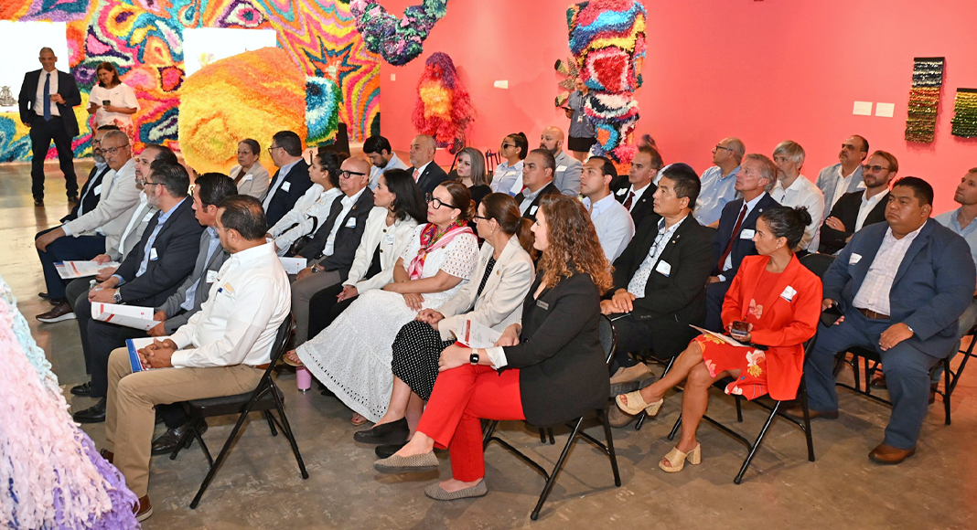 Business leaders, manufacturers, economic development professionals, educators, and international guests filled the presentation room at the International Museum of Art & Science in McAllen during the COSTEP and Clúster Eléctrico-Electrónico de Tamaulipas meeting, where participants discussed opportunities to strengthen manufacturing, workforce development, and cross-border collaboration. Photo by Roberto Hugo González / Texas Border Business.