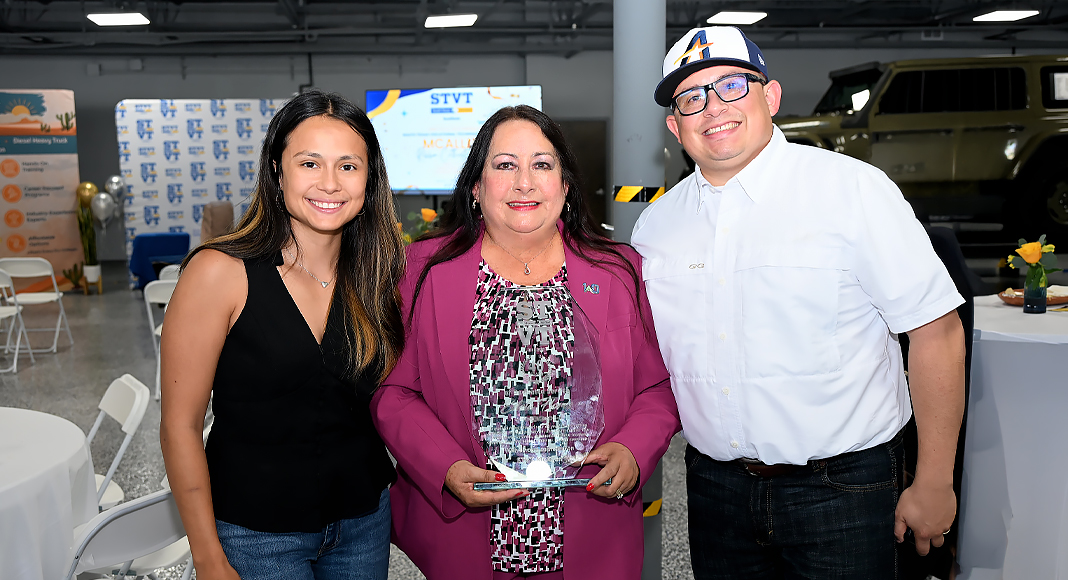 Estela Flores holds her recognition honoring 40 years of service with South Texas Vocational Technical Institute as she is joined by her closest family members during the celebration at the STVT McAllen campus. Photo by Texas Border Business