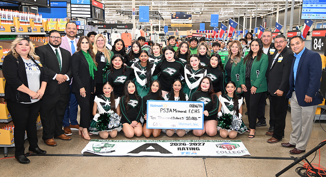 Students hold a $10,000 grant check for PSJA Memorial Early College High School as Alamo Mayor J.R. Garza, Principal Raquel Garcia and Walmart staff join them during an event at the Alamo Walmart. Photo by Noah Mangum González / Texas Border Business